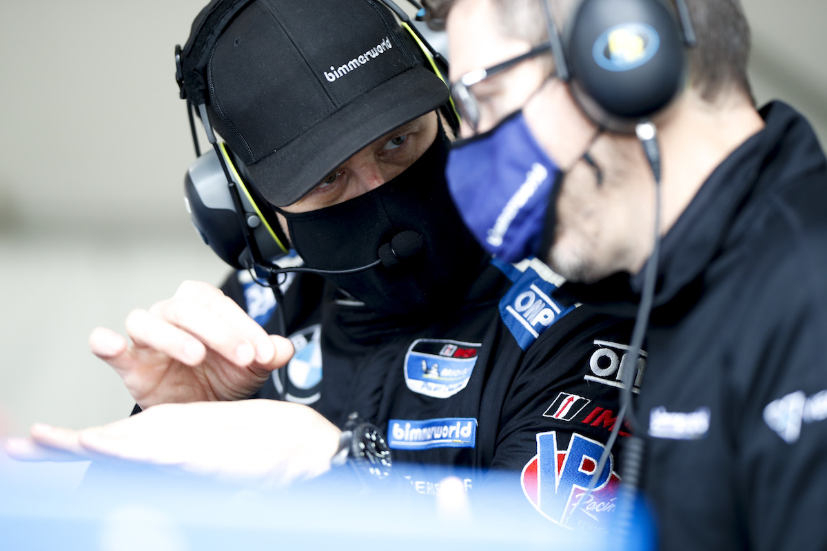 Masked James Clay talking strategy BimmerWorld Racing - IMSA Michelin Pilot Challenge - Daytona International Speedway