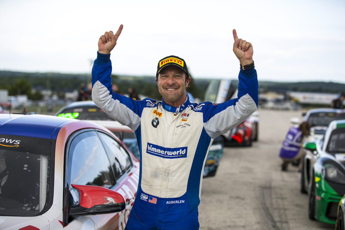 Bill Auberlen celebrating his win with BimmerWorld at Road America
