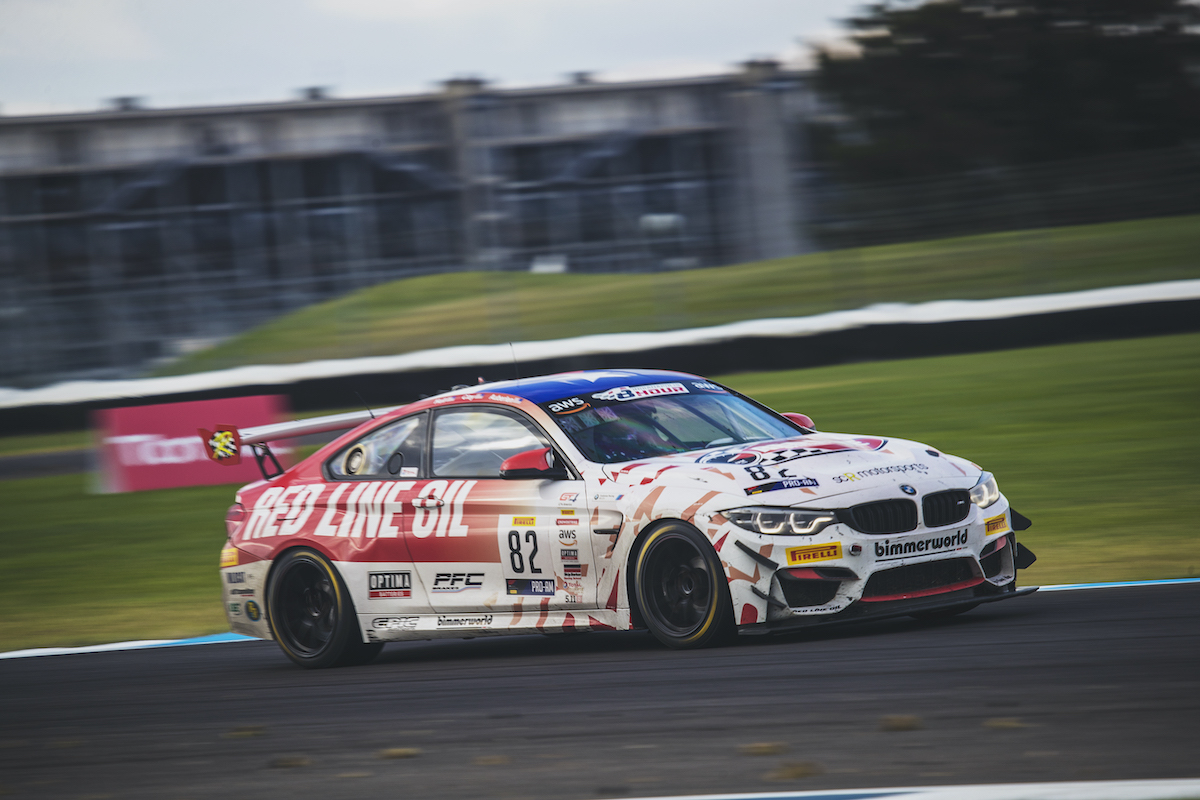 BimmerWorld Red Line Oil M4 GT4 charging hard at Indy
