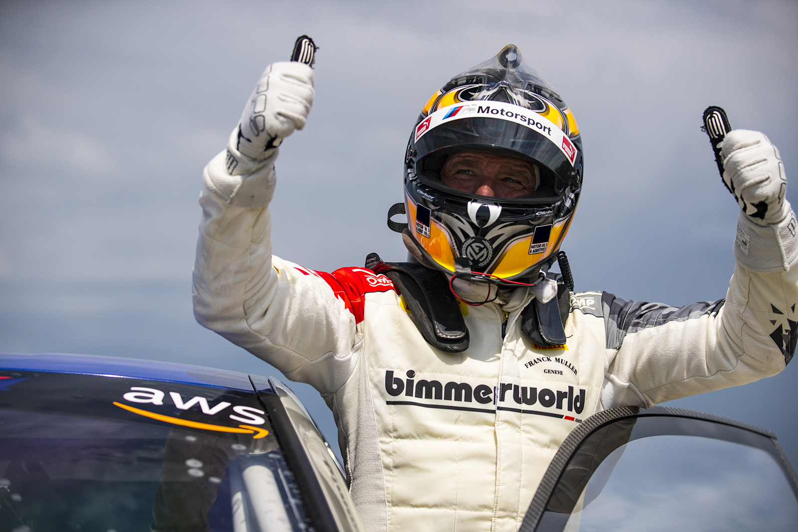 Auberlen getting out of his BimmerWorld M4 GT4 after winning at Road America