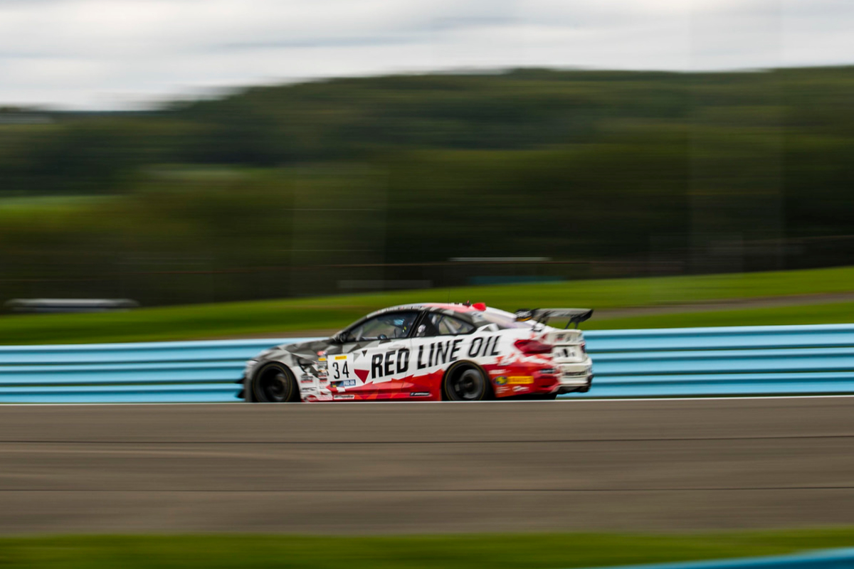 No. 34 M4 GT4 at speed at Watkins Glen 2021