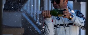 Auberlen spraying champagne at Watkins Glen 2021