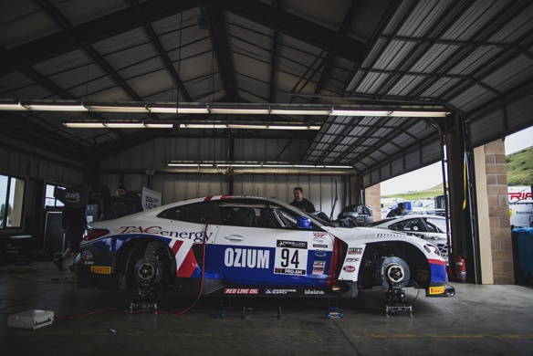 No. 94 M4 GT3 on air jacks in the garage