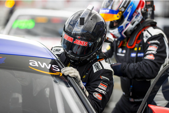 Devin Jones getting in car during driver change